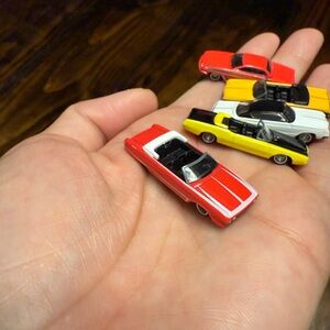 6 tiny little mini cars. Atlas and Malibu brand. Collector